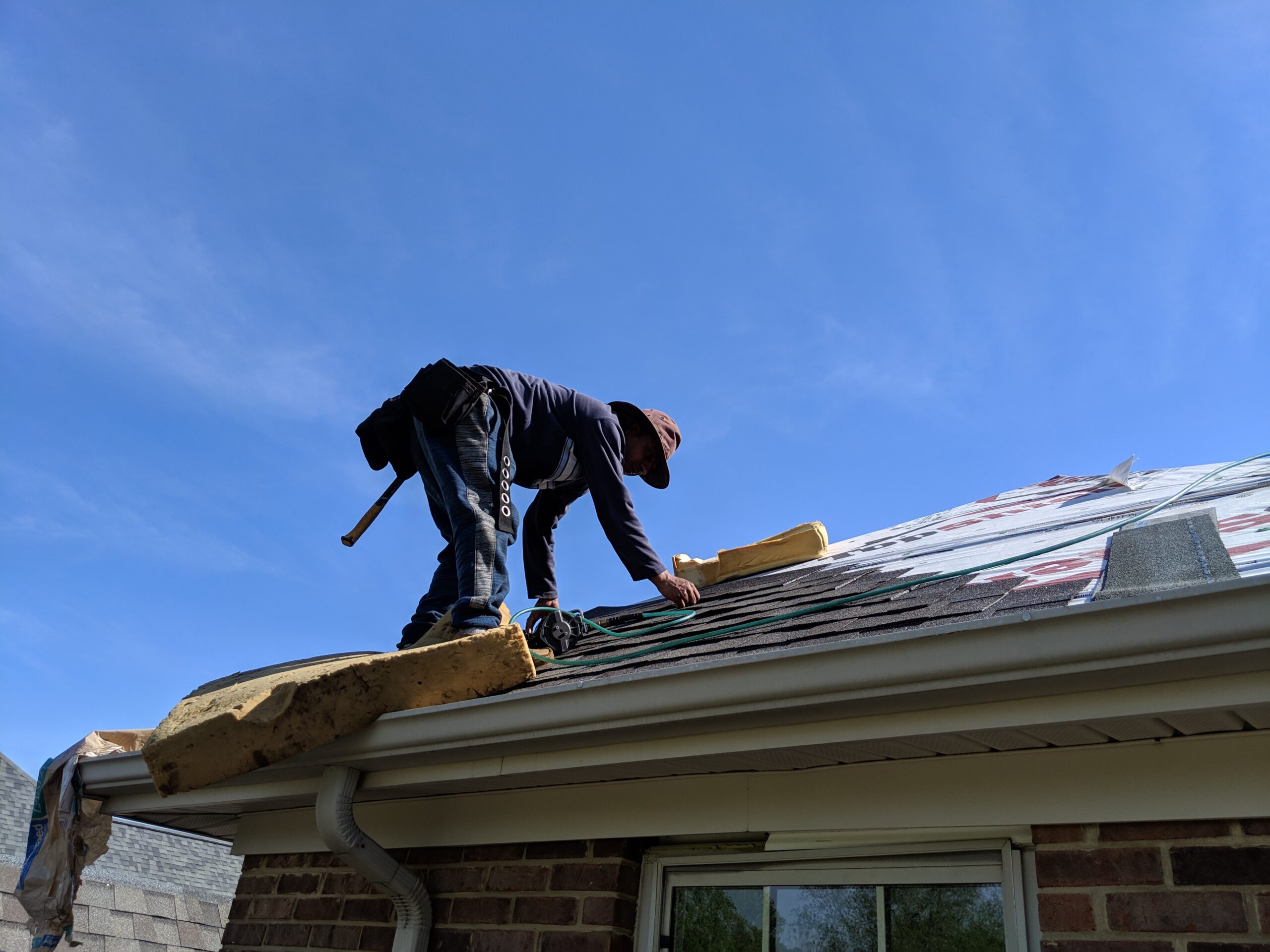 Man working on the roof_Cover Pro Roofing